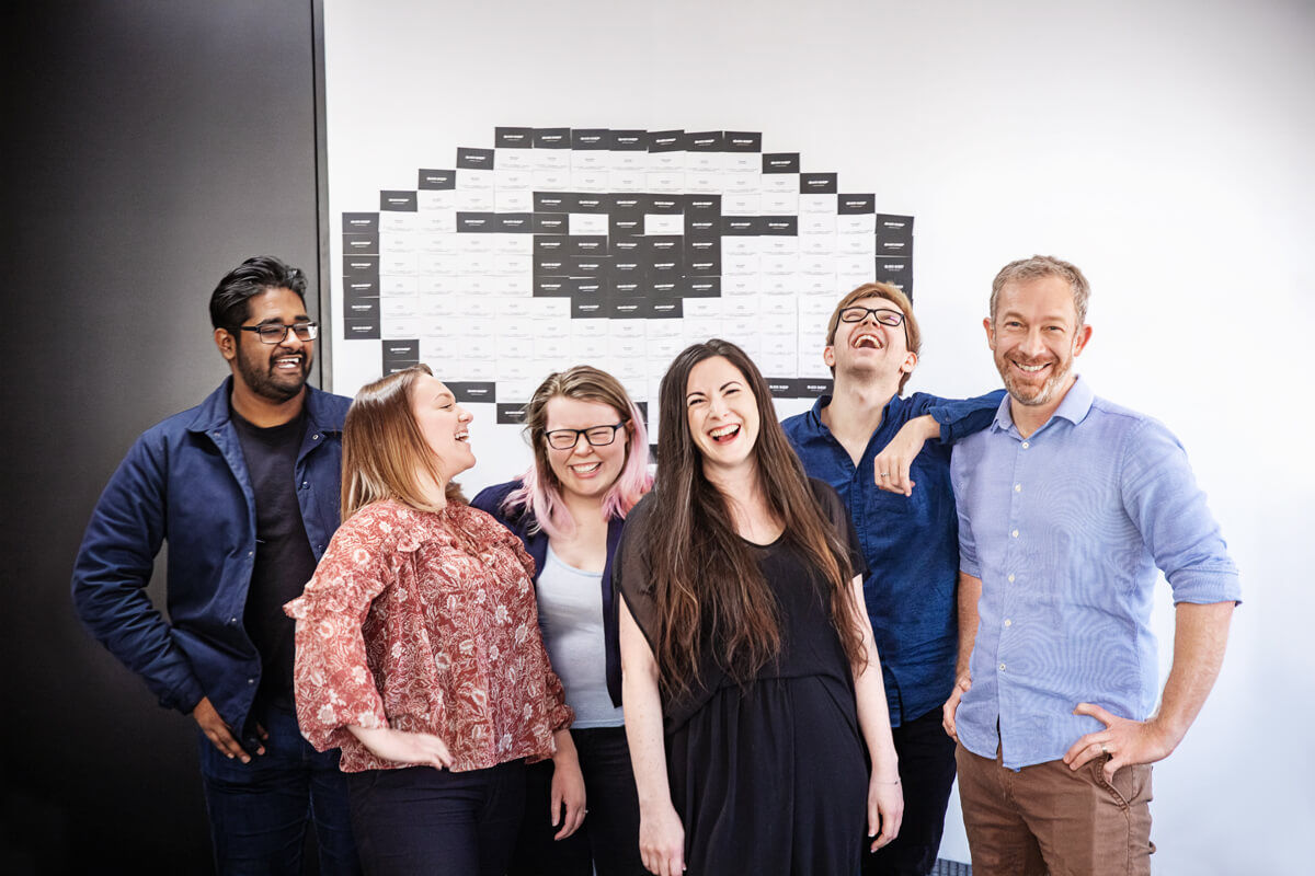 A group of people laughing together